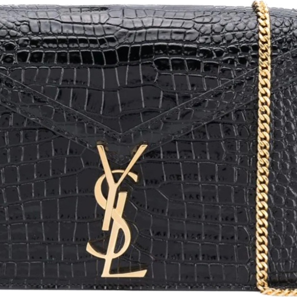 ISO of a black Cassandra medium chain bag in crocodile embossed shiny leather.